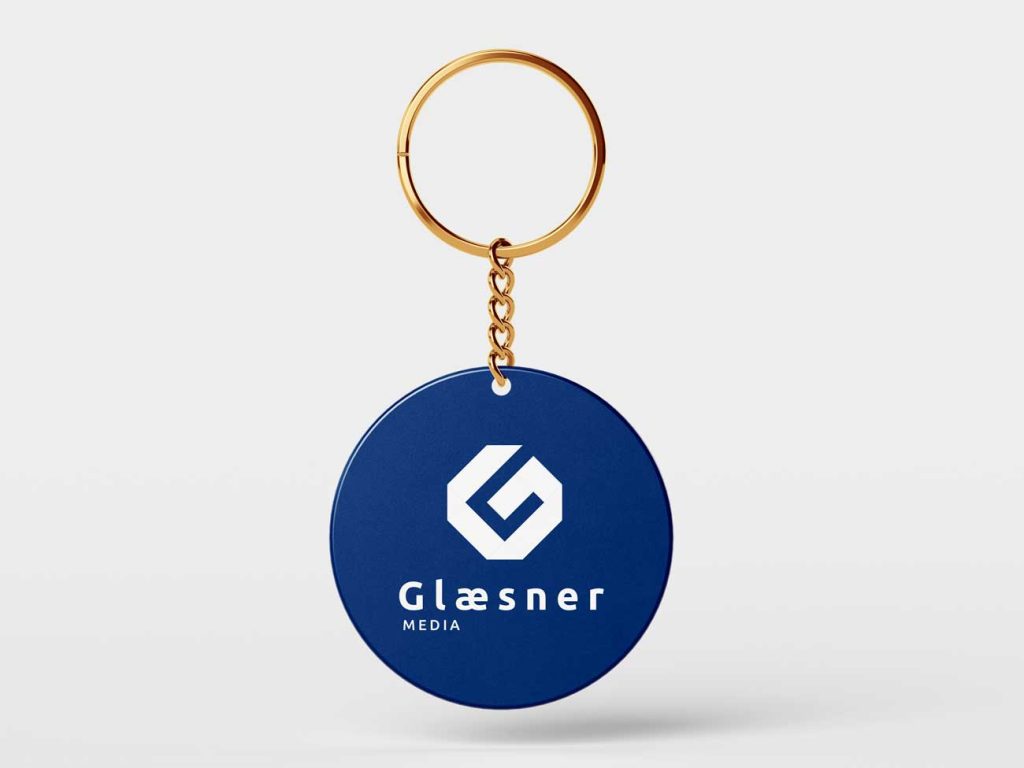 Glæsner Media logo på nøglering